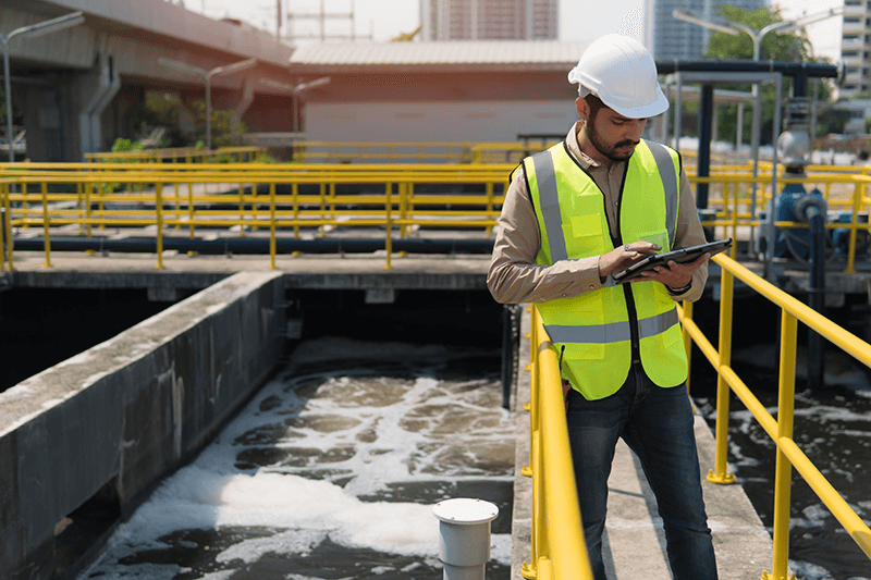 man working at water treatment plant