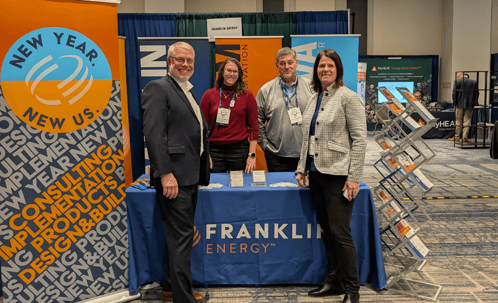 people at tradeshow booth