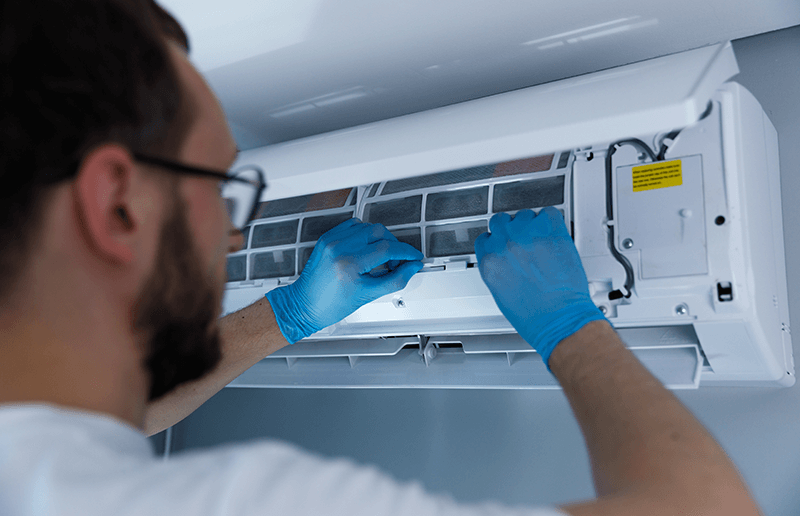 person working on hvac system