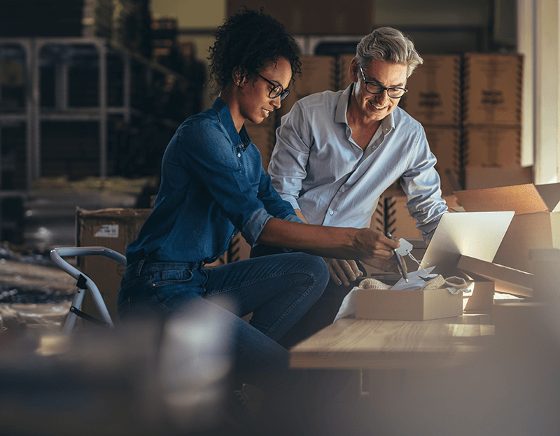 people working at their small business